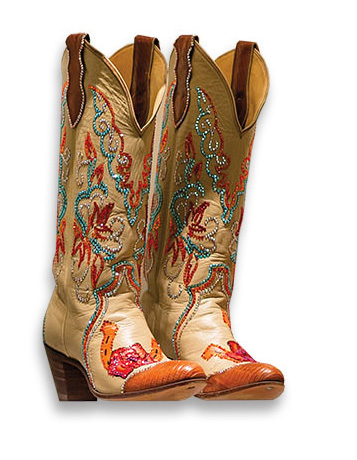 A pair of red and white, brightly colored cowboy boots