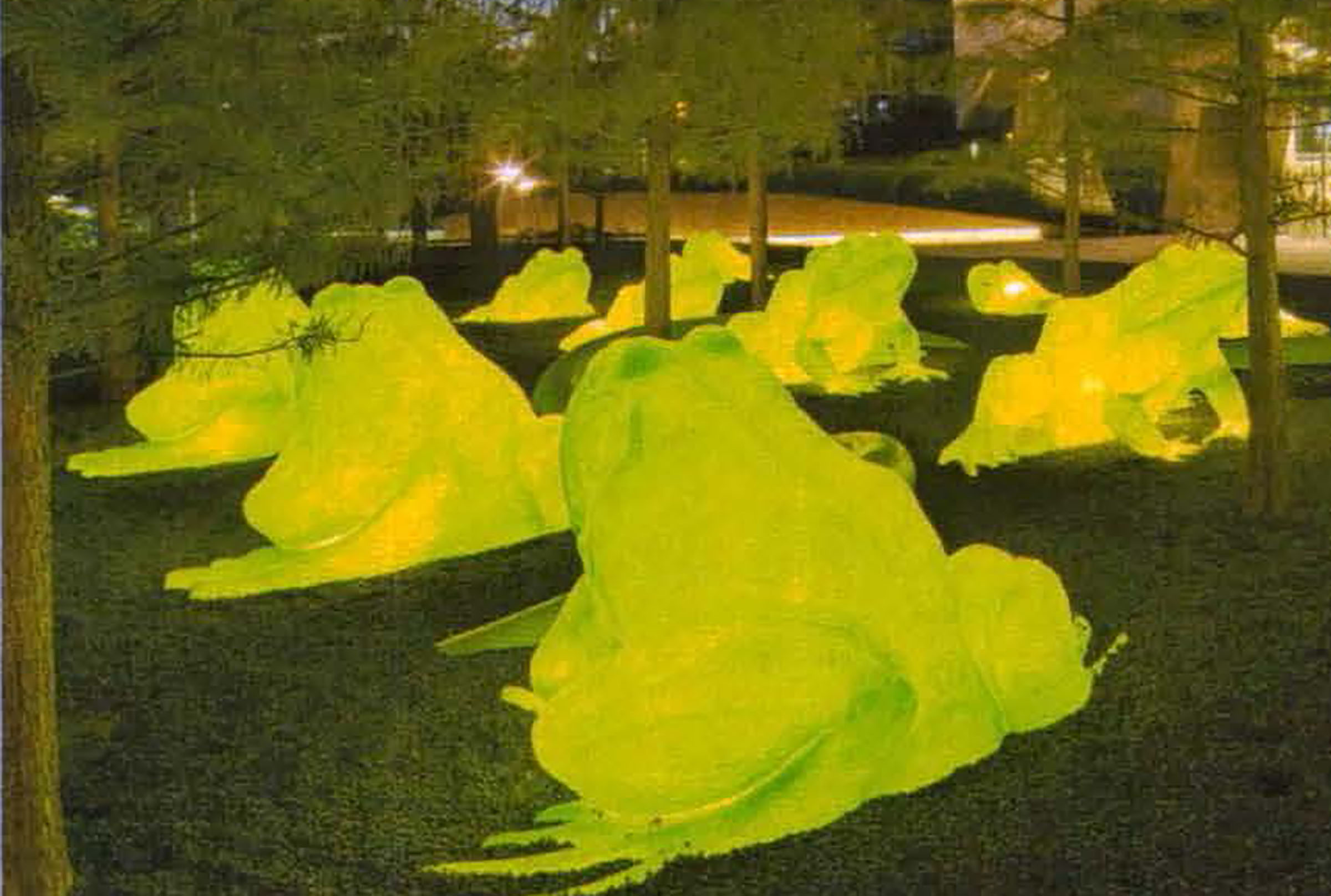Numerous glowing leap frog displays on museum grounds