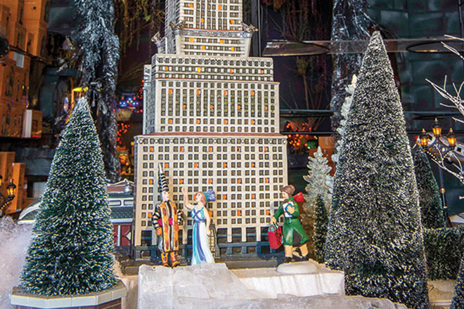 A Christmas scene with fake trees and small figurines
