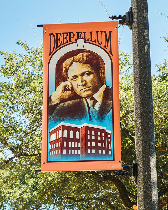 An orange sign reading "Deep Ellum"
