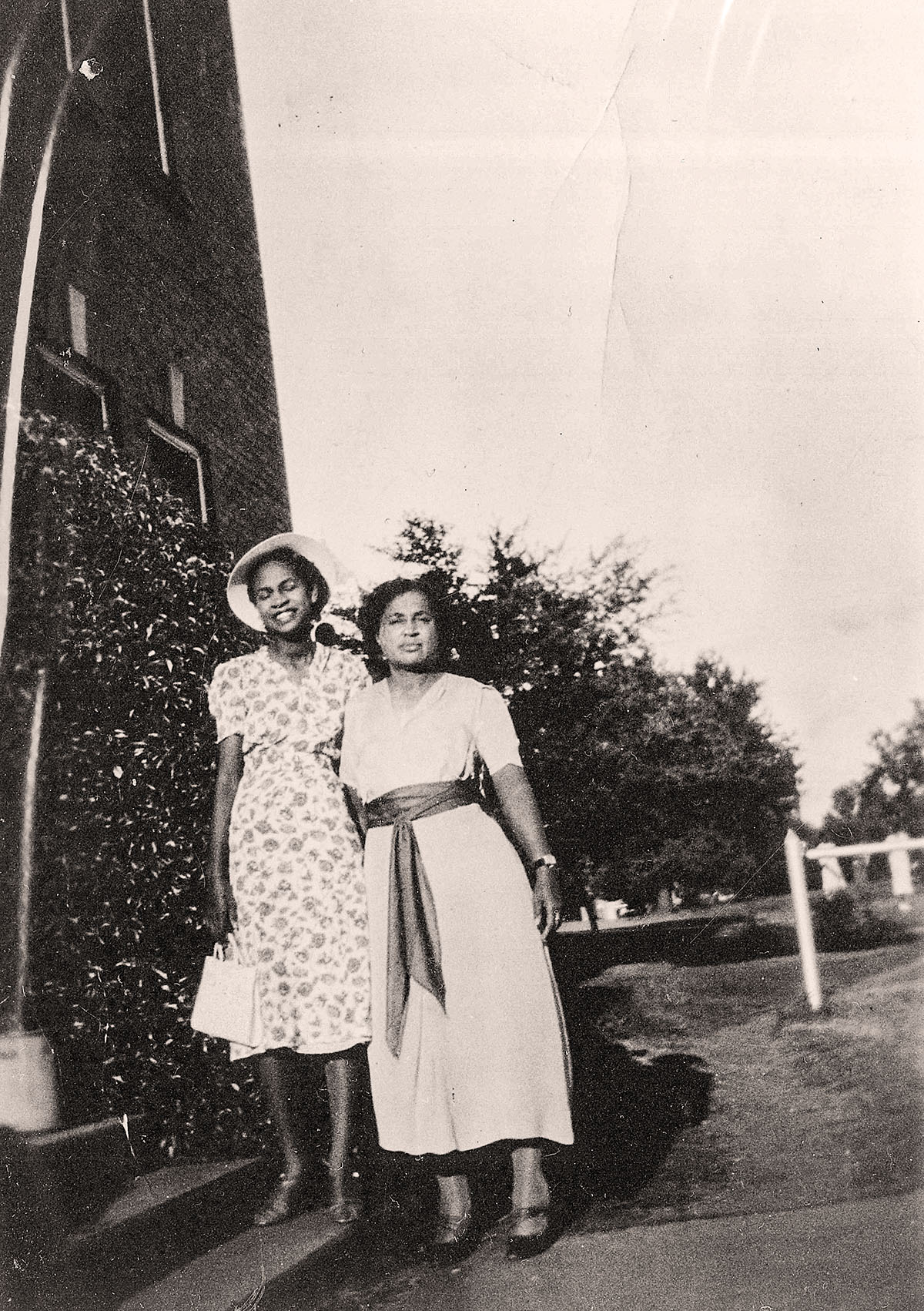 A black and white picture of Diane and another child in a white dress