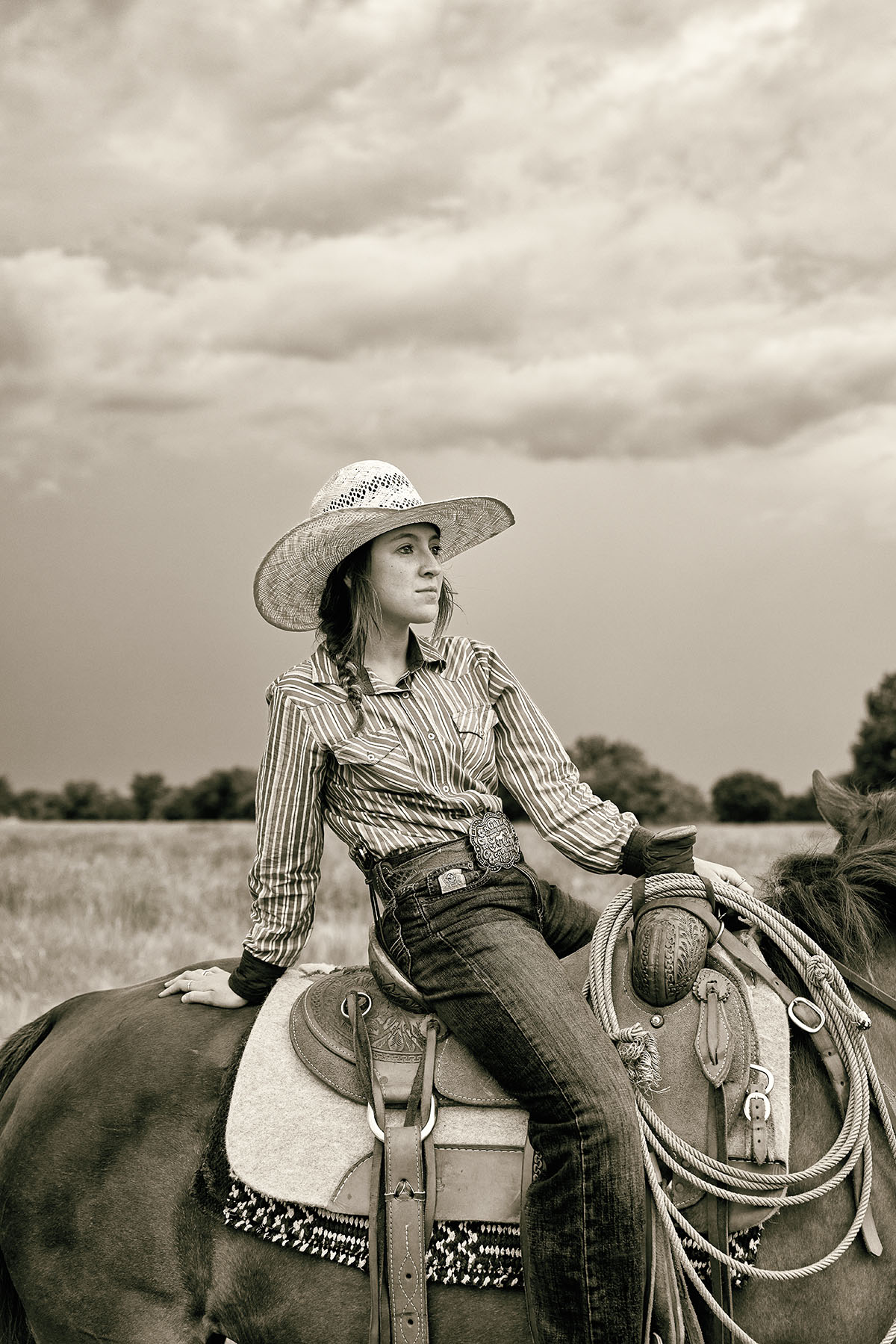 Cowgirl riding her horse