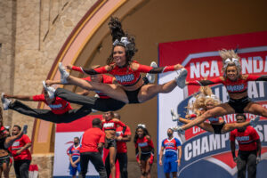The Navarro cheerleaders show off their best toe touch at competition in Daytona.