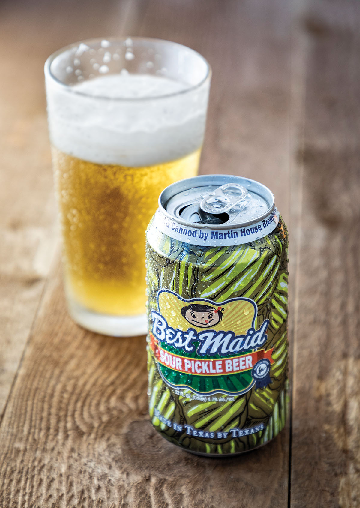 A can of beer with pickles and the Best Maid logo next to a poured pint of beer
