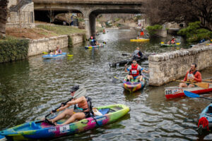 Participants and Spectators Alike Cheer for the San Antonio River Basin Paddling Race Series