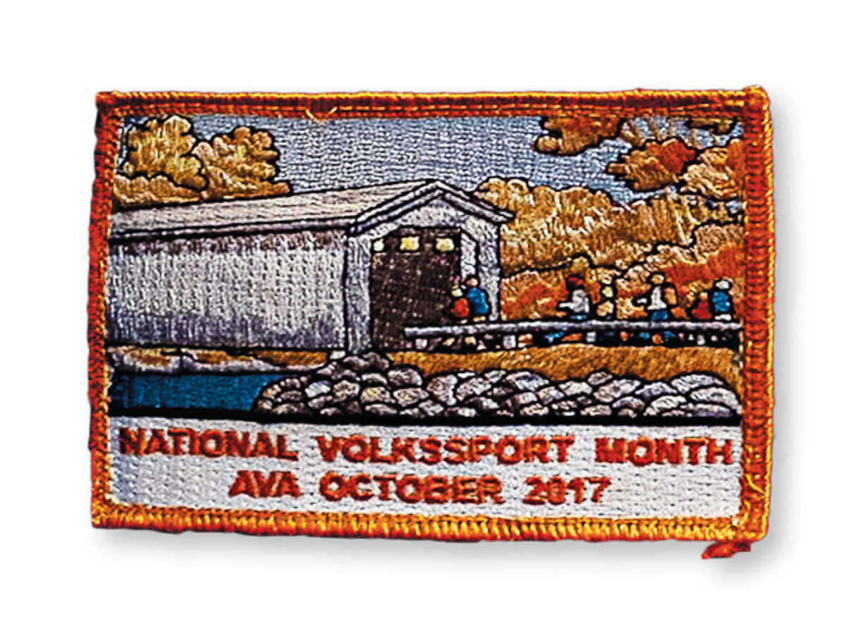 A picture of a red and orange sewn patch reading 'National Volksport Month AVA October 2017