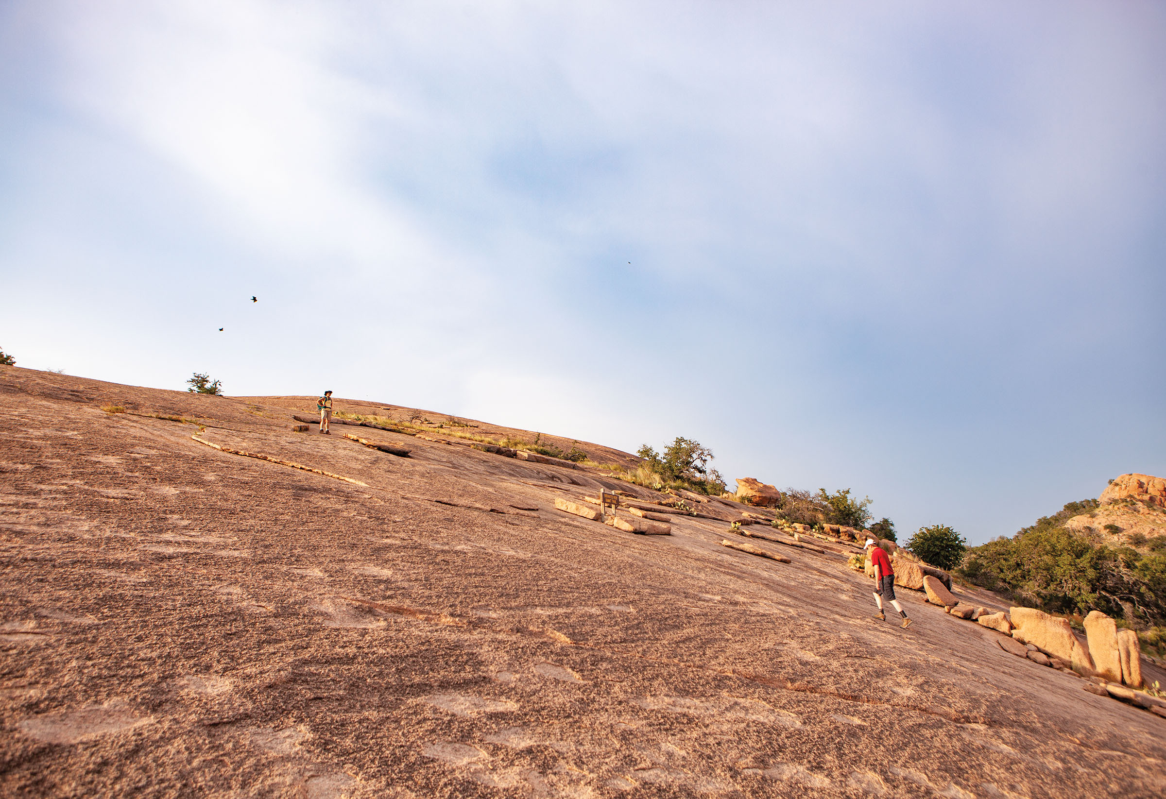 A picture of people near the top of Enchanted Rock