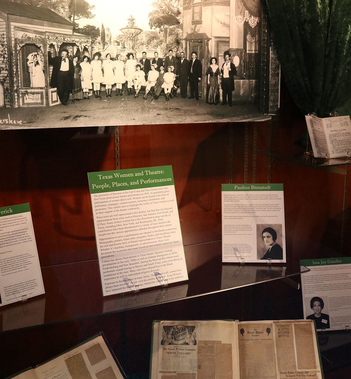 A picture of various artifacts and historical photos on display