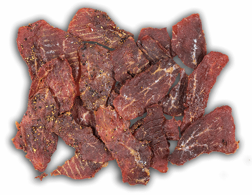 A large pile of reddish brown beef jerky, seasoned to perfection