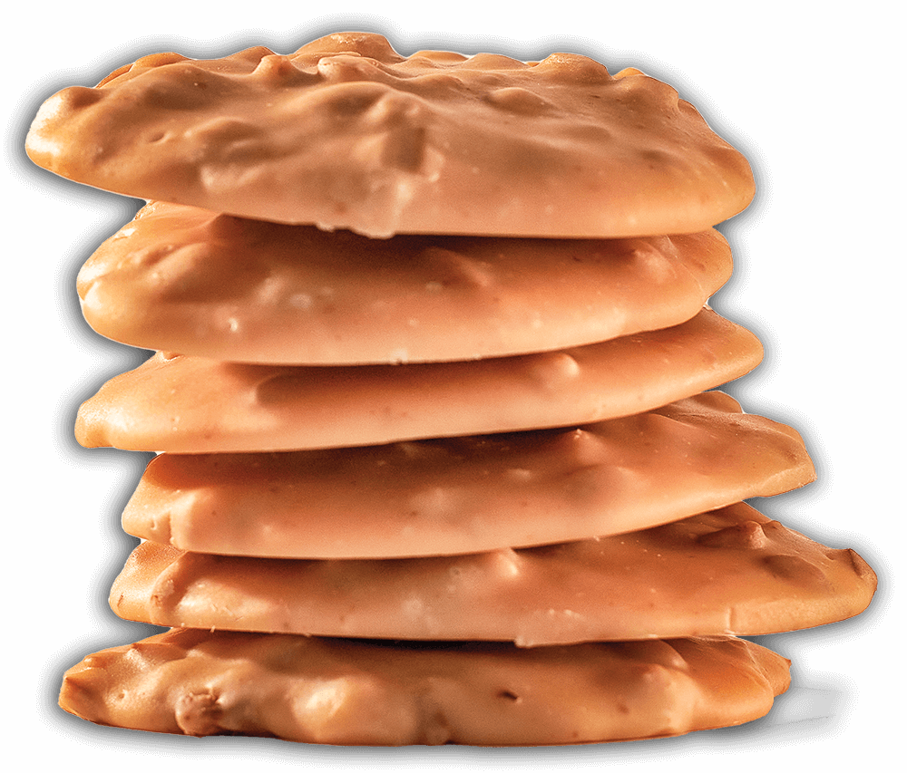 A stack of golden pecan pralines