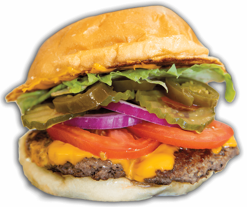 A cheeseburger piled high with lettuce, onion, pickles and tomatoes