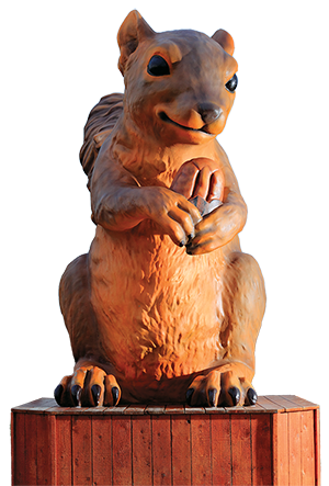 A statue of a squirrel holding a nut