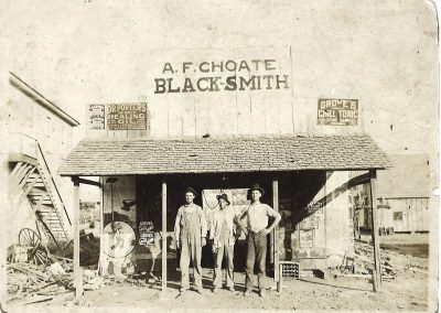 A Family Photo Depicts a Blacksmith Shop in Keller