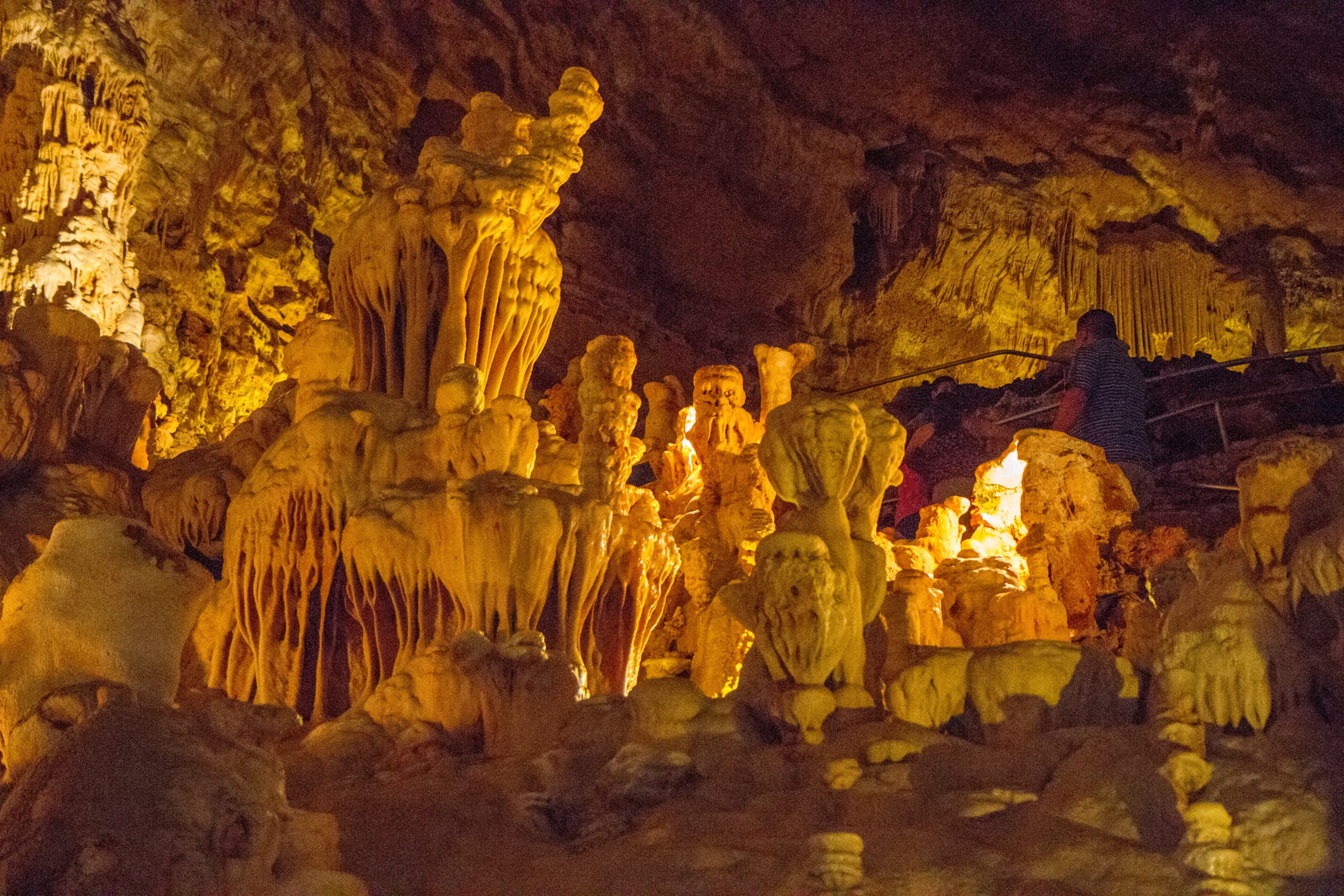 Underground caverns illuminated by artificial light