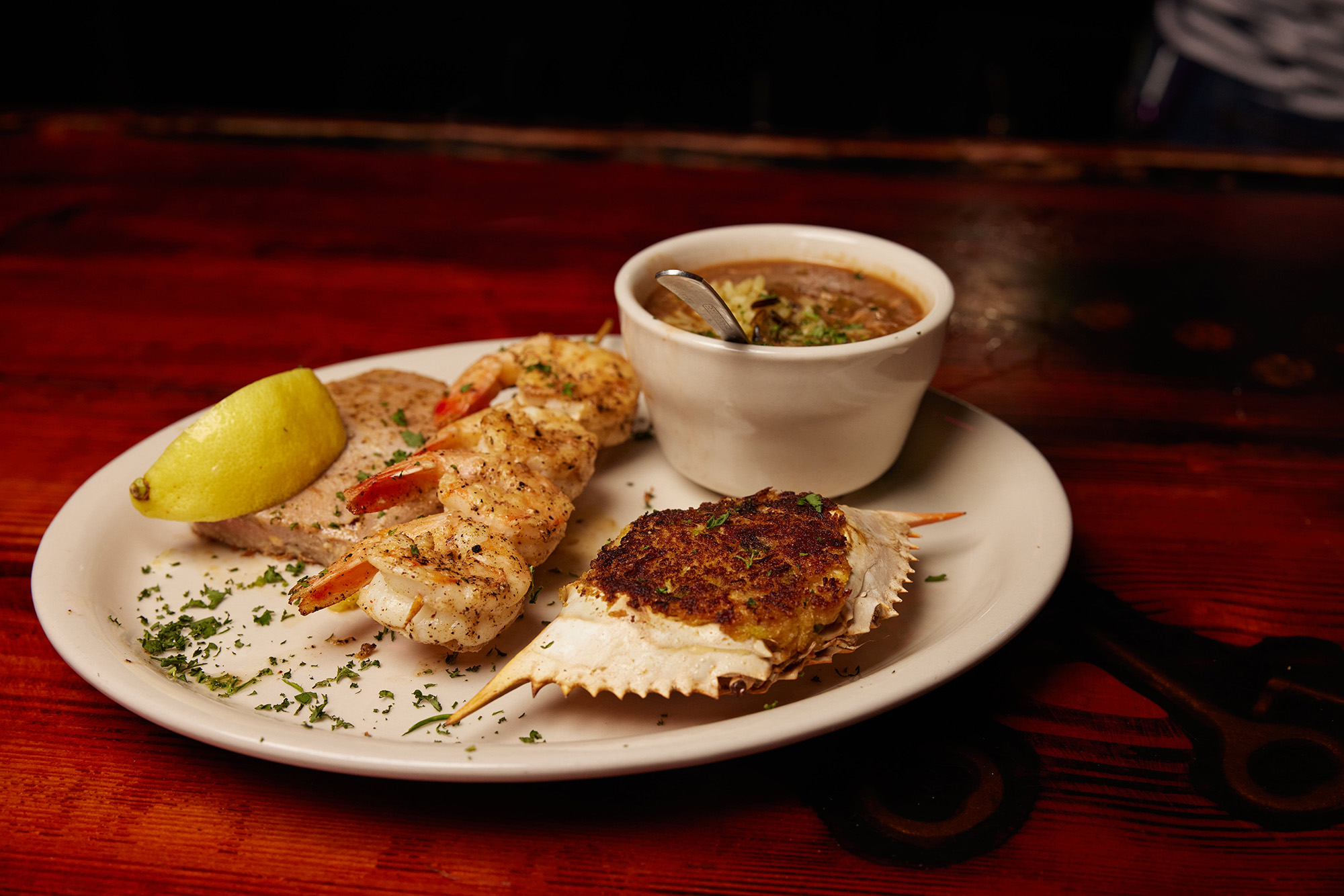 A plate of seafood features crab, shrimp, and more at Moby Dick's