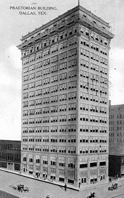 A black and white picture of a tall building with carriages out front