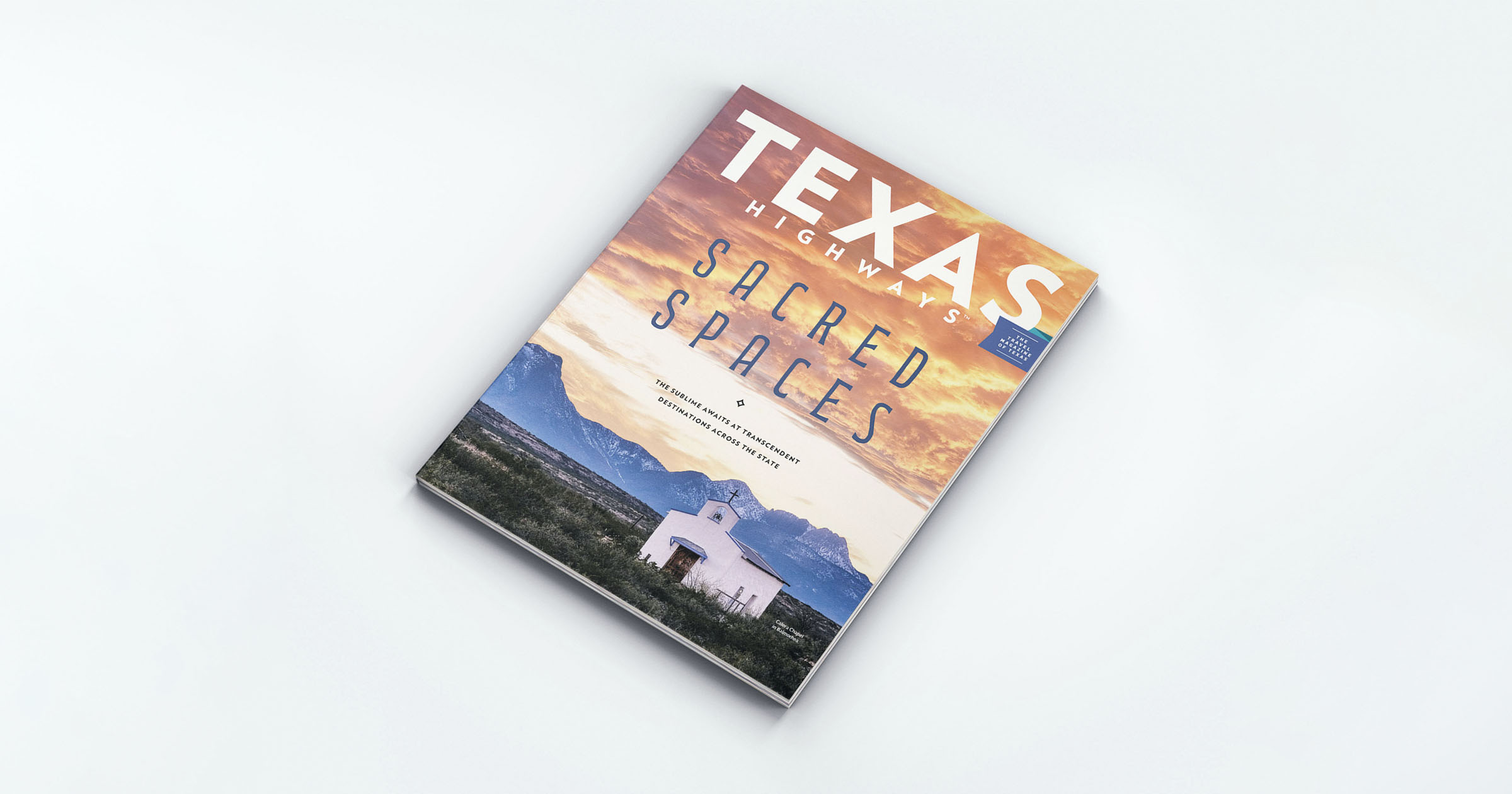 The February 2023 "Sacred Spaces" cover of Texas Highways features a church in the Big Bend area in front of a small mountain range