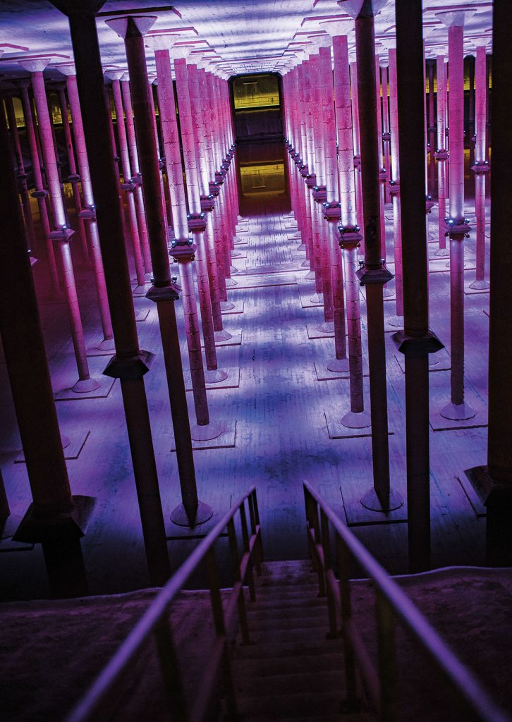 A purple-lit cavernous cistern