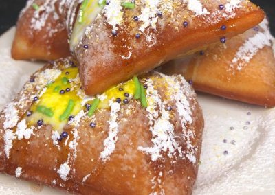 Where To Get Your King Cake and Beignet Fix in Texas This Mardi Gras Season