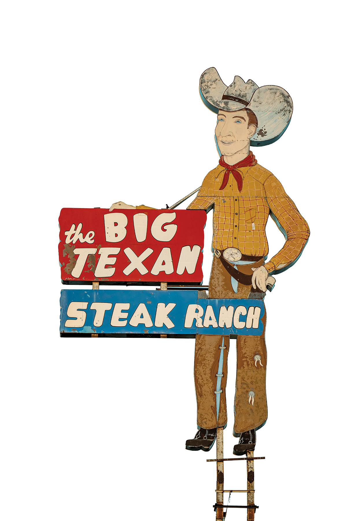 A cutout of a sign reading "the Big Texan Steak Ranch" and a large cowboy
