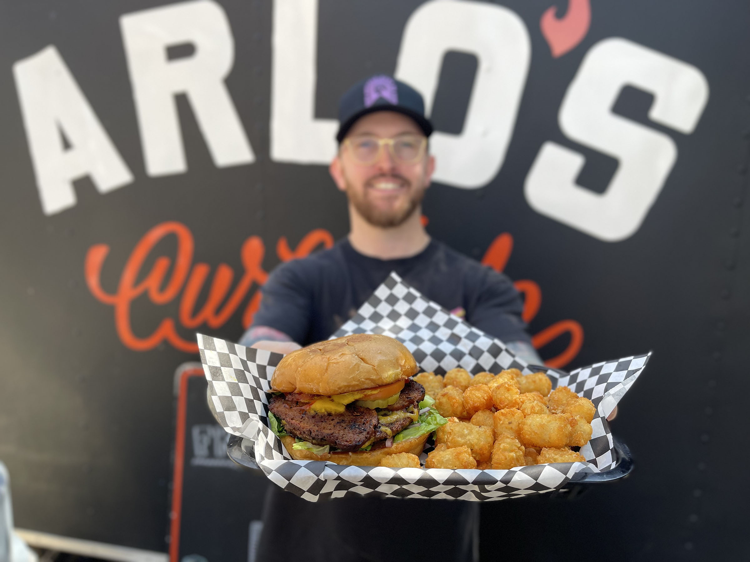 color photo of bacon cheeseburger on grill