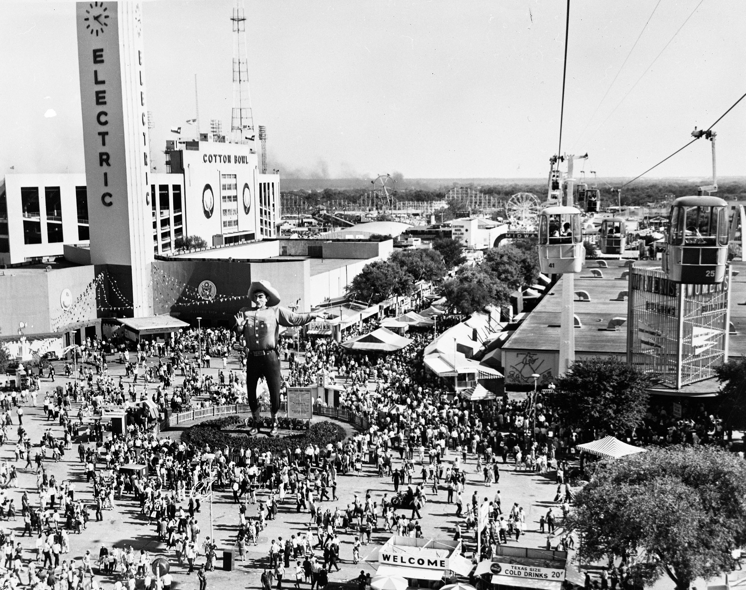 A black and white picture of an overhead view of crowds at the Texas State Fair