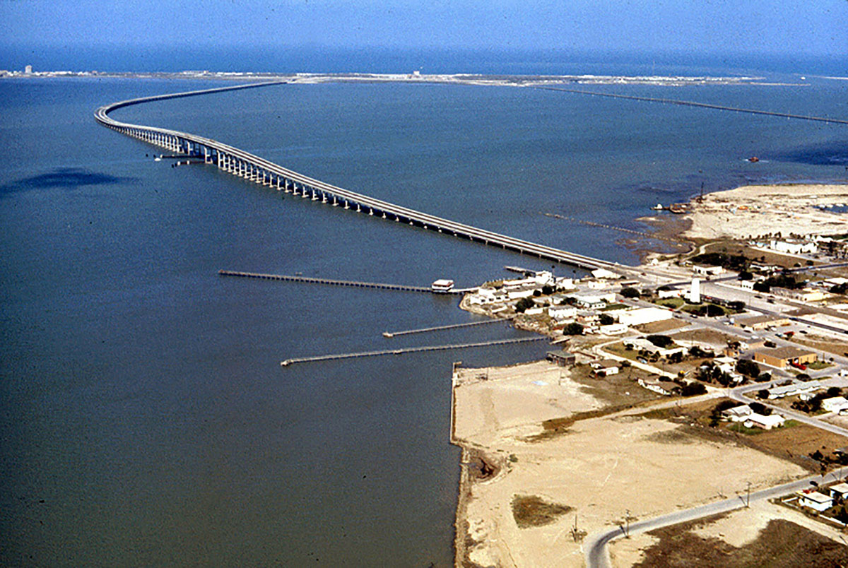 An overhead view of a bridge to an island