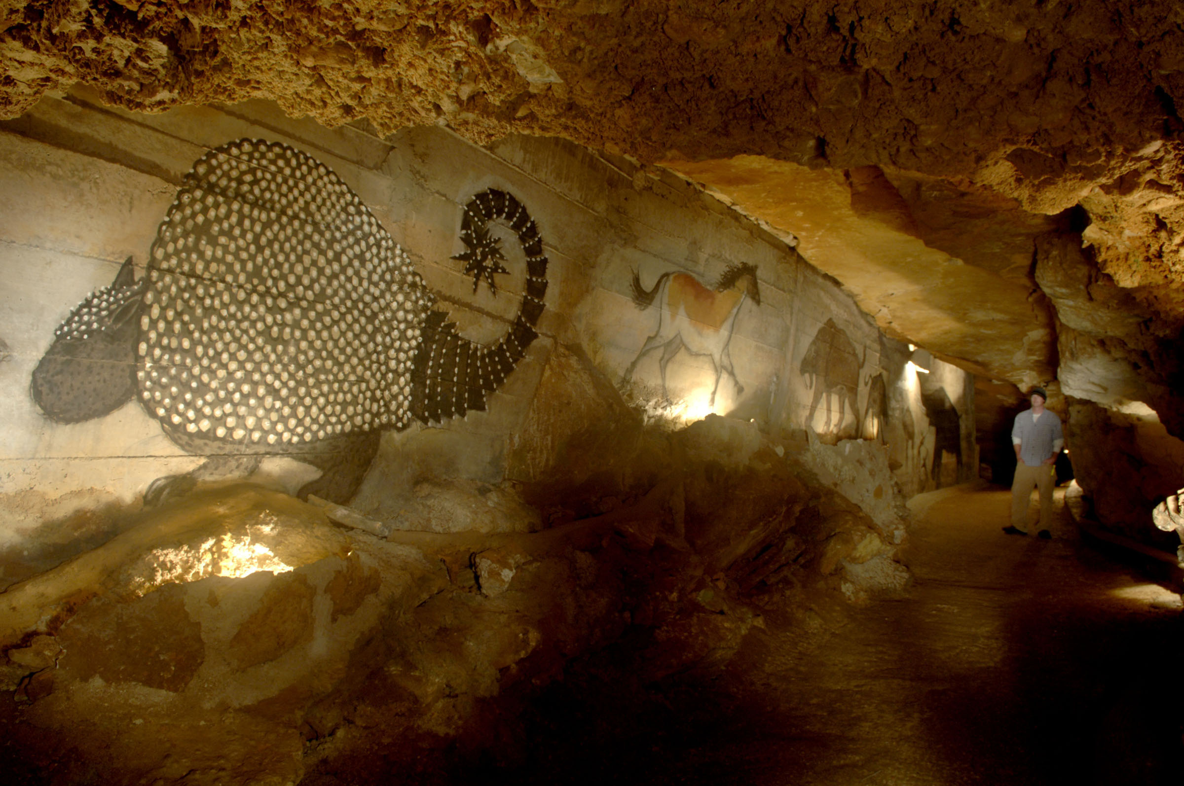 A cave painting on the wall of a small cavern.