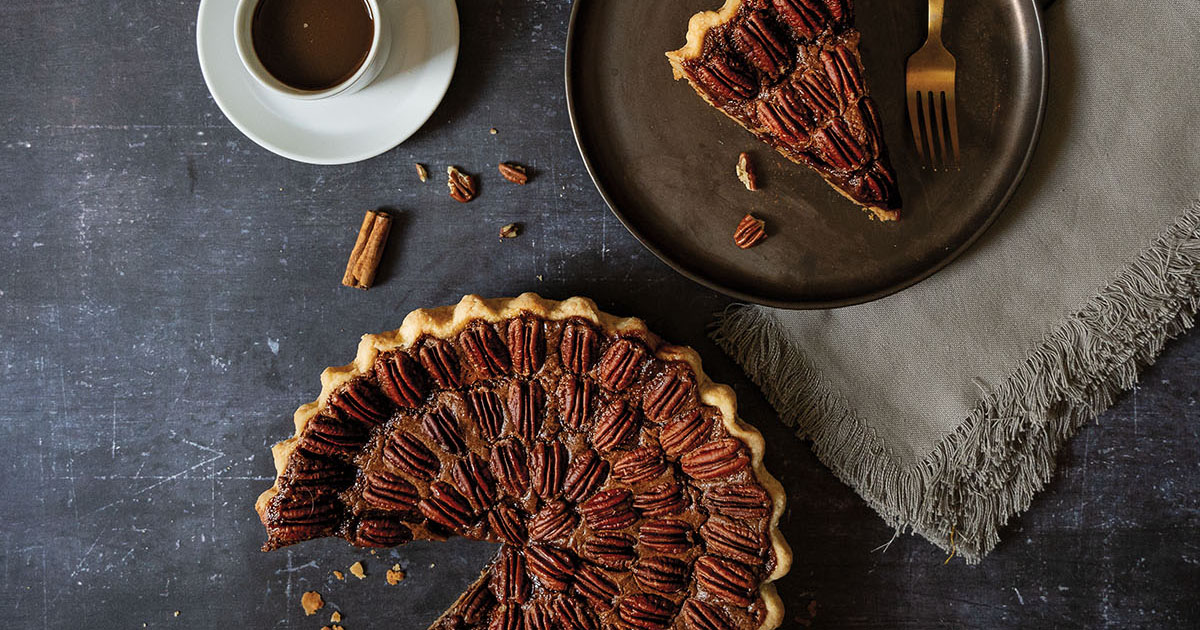 A chocolate pecan pie and coffee