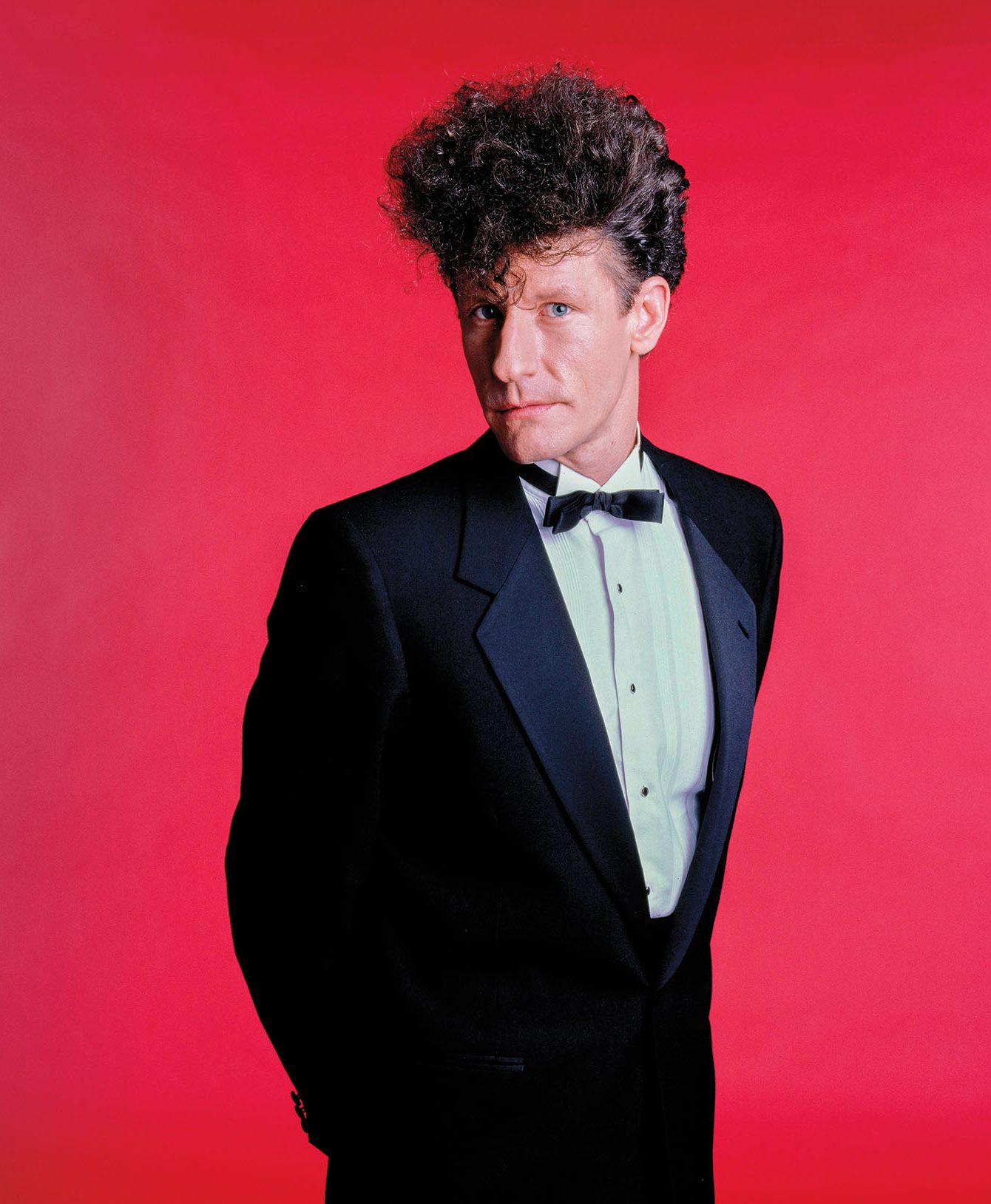 Photo of musician Lyle Lovett in a tuxedo