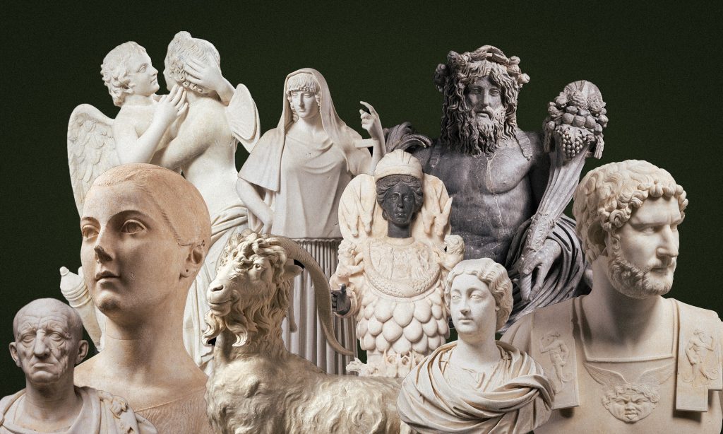 Several marble busts of people, a goat, and other figures on a green background