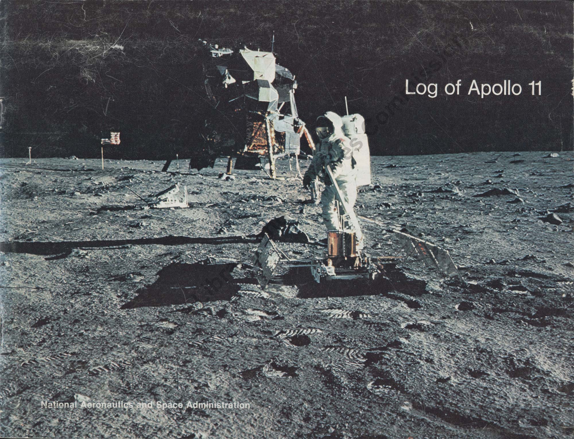 An astronaut standing on the moon's surface, in front of a lunar lander and an American flag