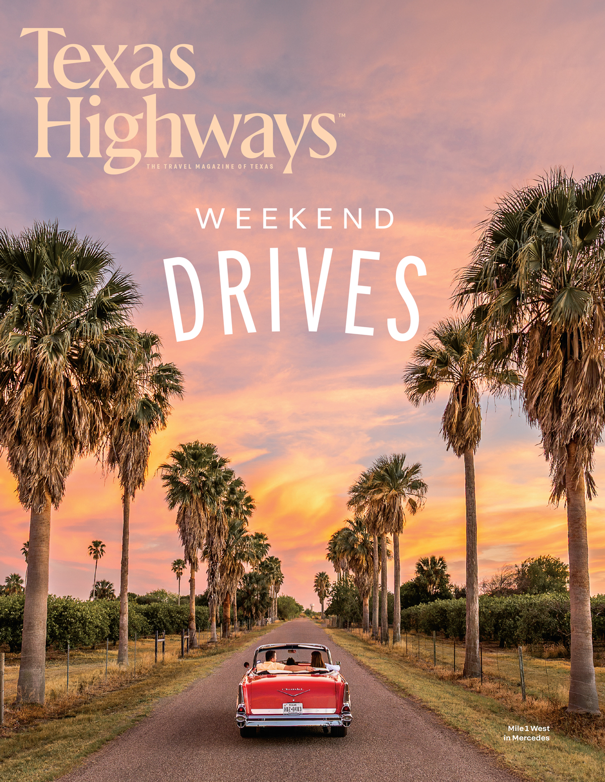 A cover of Texas Highways magazine that reads Weekend Drives and shows an older red car driving down a road lined by palm trees at sunset