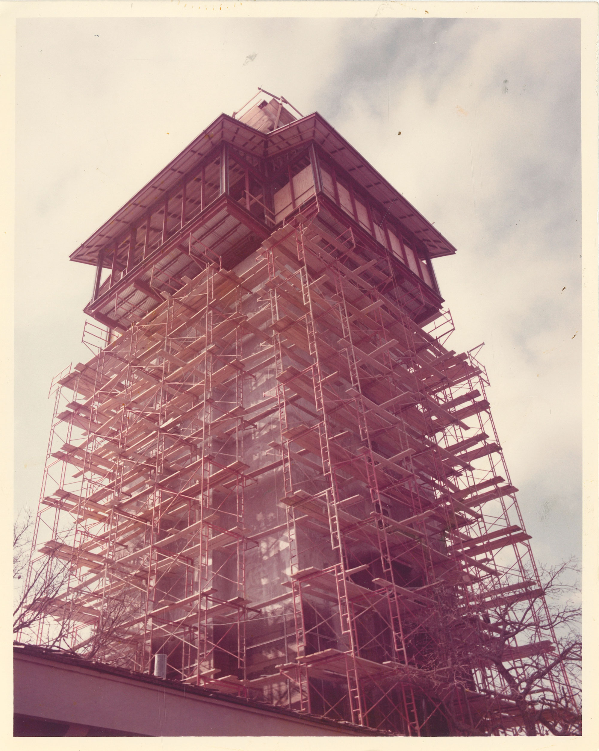 A large tower under construction with scaffolding throughout the exterior